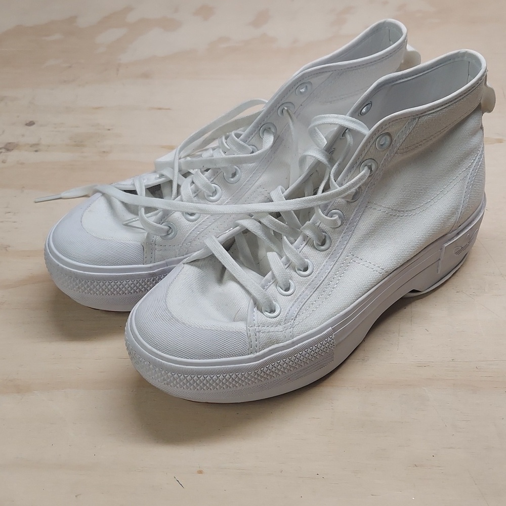 Chunky white Adidas high tops some scuffing and wear but almost none. Nearly new